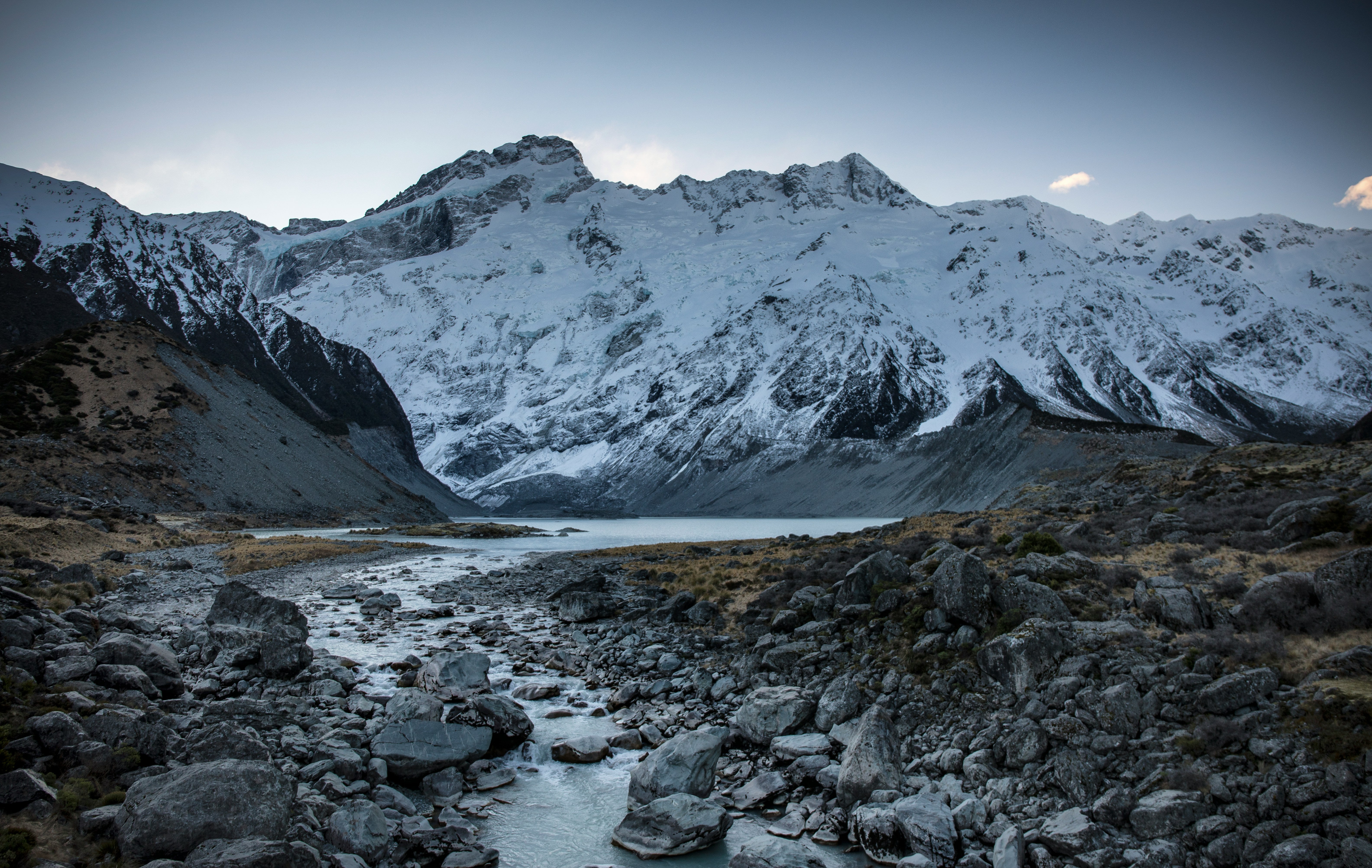 wilderness mountain range with snow covered peaks